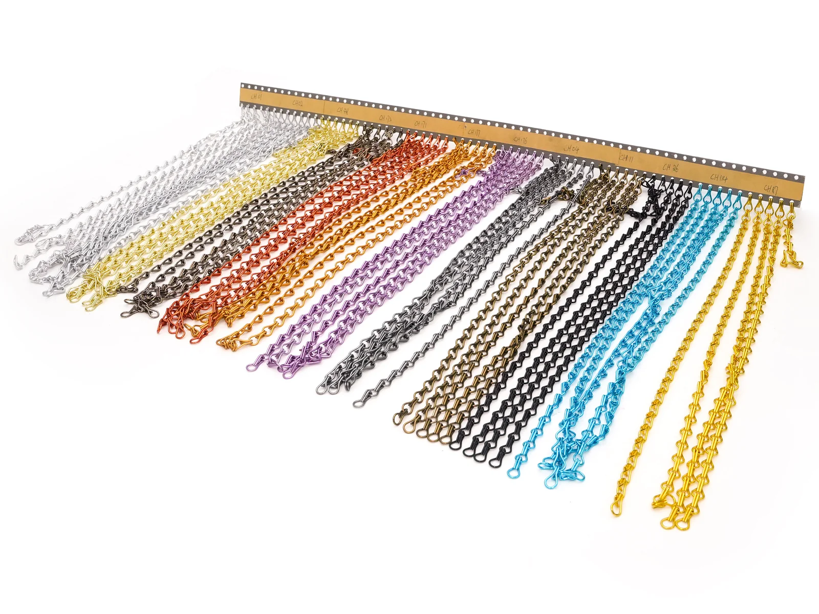 Separate linked chain strands suspended from a top bar