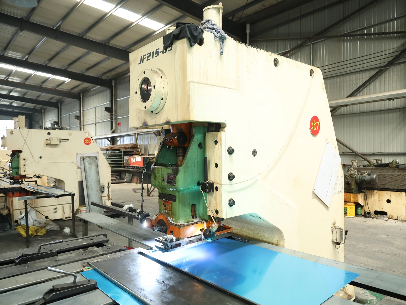 amber factory punching equipment 01 Sheet punching equipment and metal workpieces in the AMBER workshop