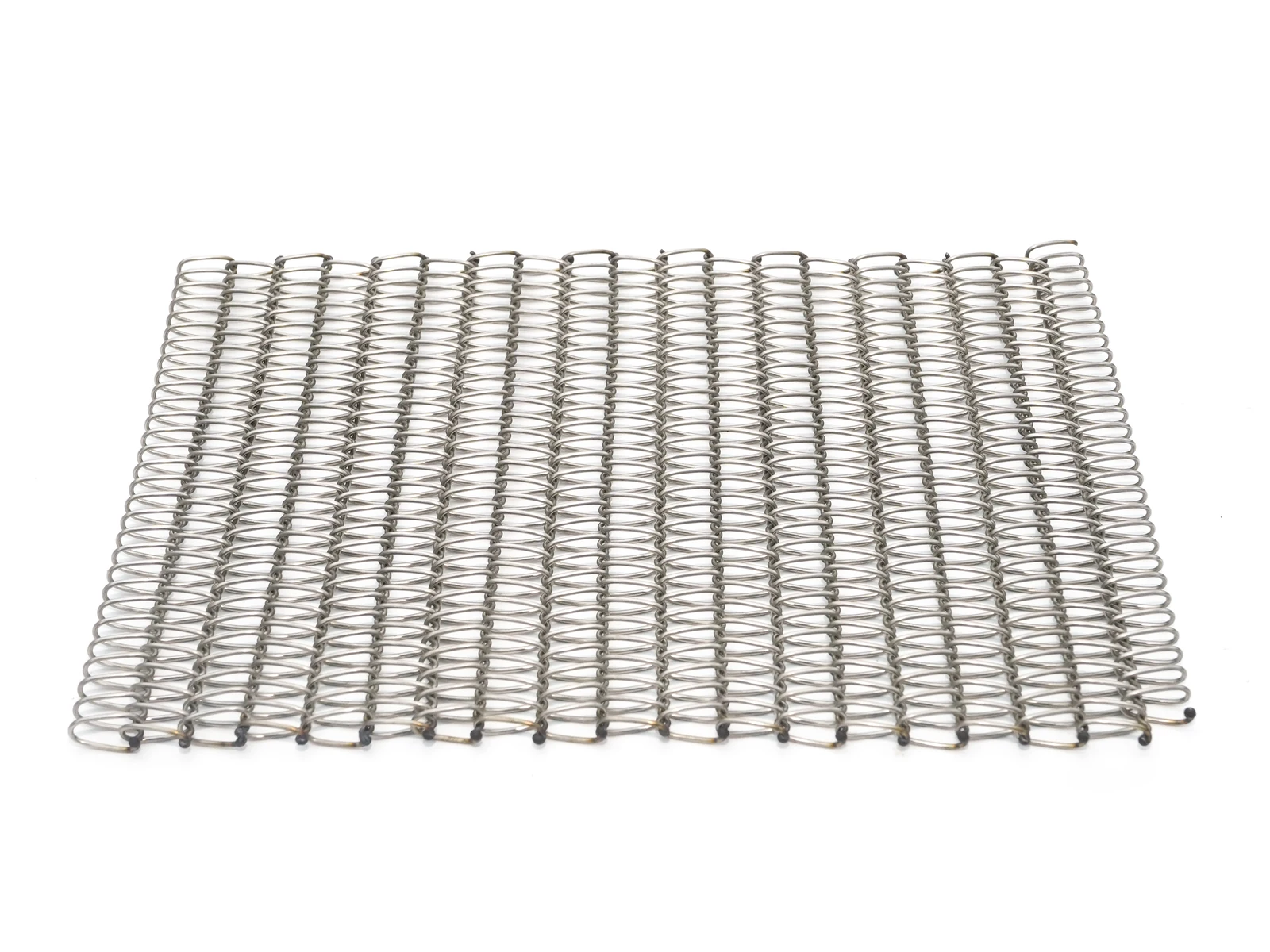 Finished spiral wire mesh sample with transverse rod ends at its edges