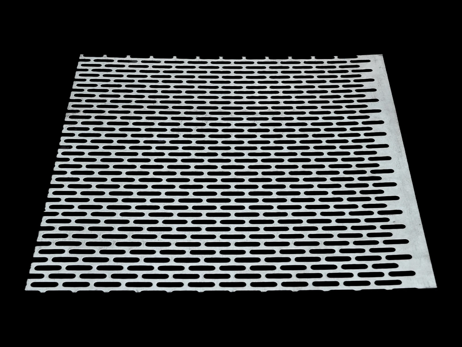 Aluminum perforated sheet sample with elongated slotted openings